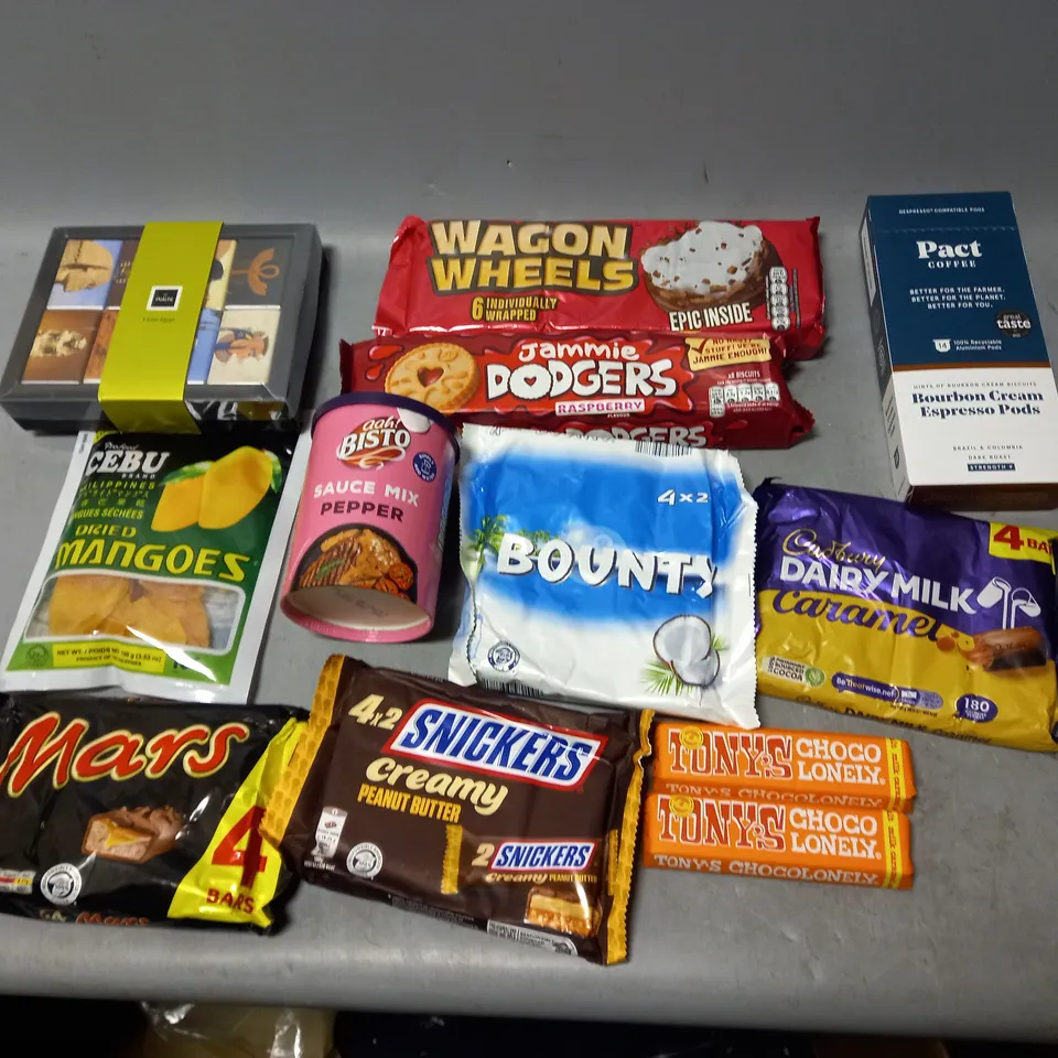 LOT OF APPROXMATELY 10 ITEMS TO INCLUDE  - WAGON WHEELS, MARS BARS, AND PACT COFFEE ETC. 