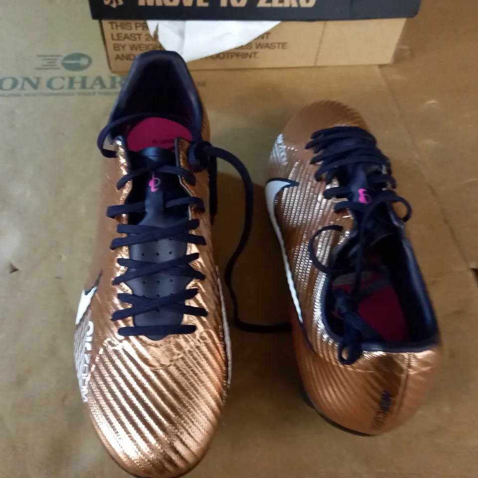 PAIR OF NIKE ZOOM VAPOR 15 ACAD SG-PRO BOOTS IN GOLD - UK 7