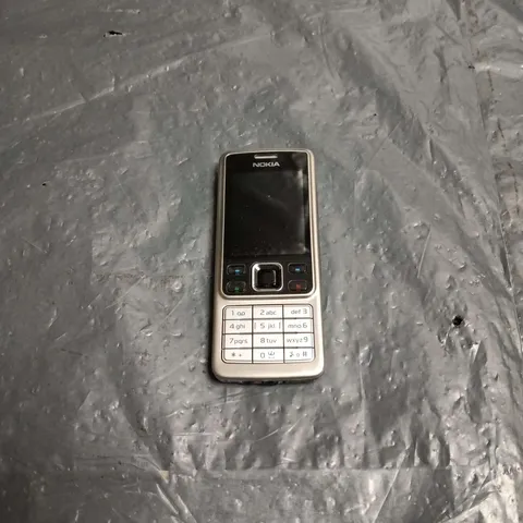 NOKIA CANDYBAR MOBILE PHONE – 2 MP CAMERA 