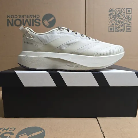 BOXED PAIR OF ADIDAS ADIZERO EVO SLATR TRAINERS IN LIGHT TAUPE SIZE UK 10