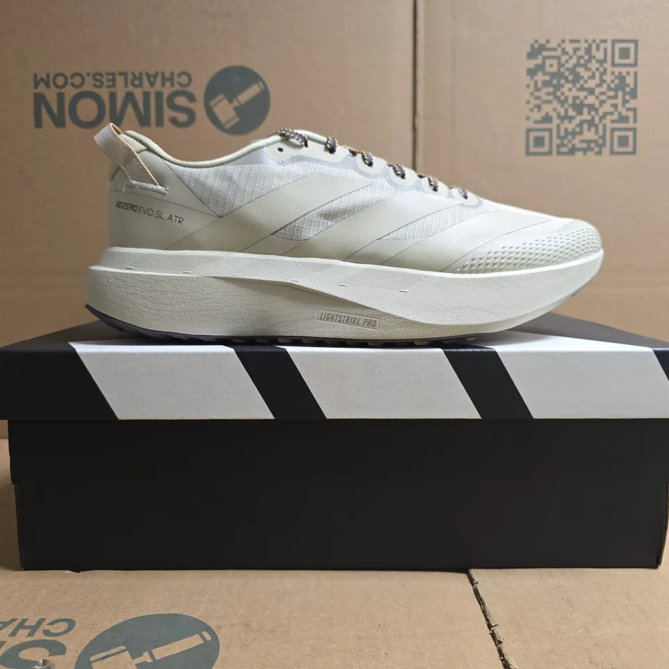 BOXED PAIR OF ADIDAS ADIZERO EVO SLATR TRAINERS IN LIGHT TAUPE SIZE UK 10