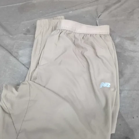 NEW BALANCE BEIGE TRACK PANTS – SIZE L