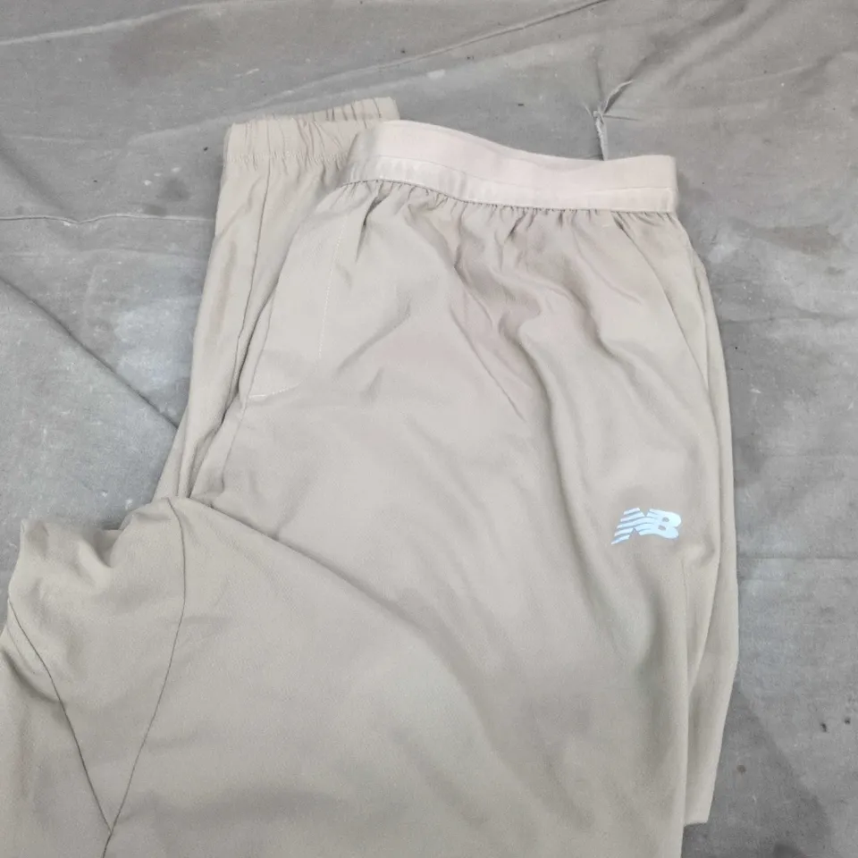 NEW BALANCE BEIGE TRACK PANTS – SIZE L