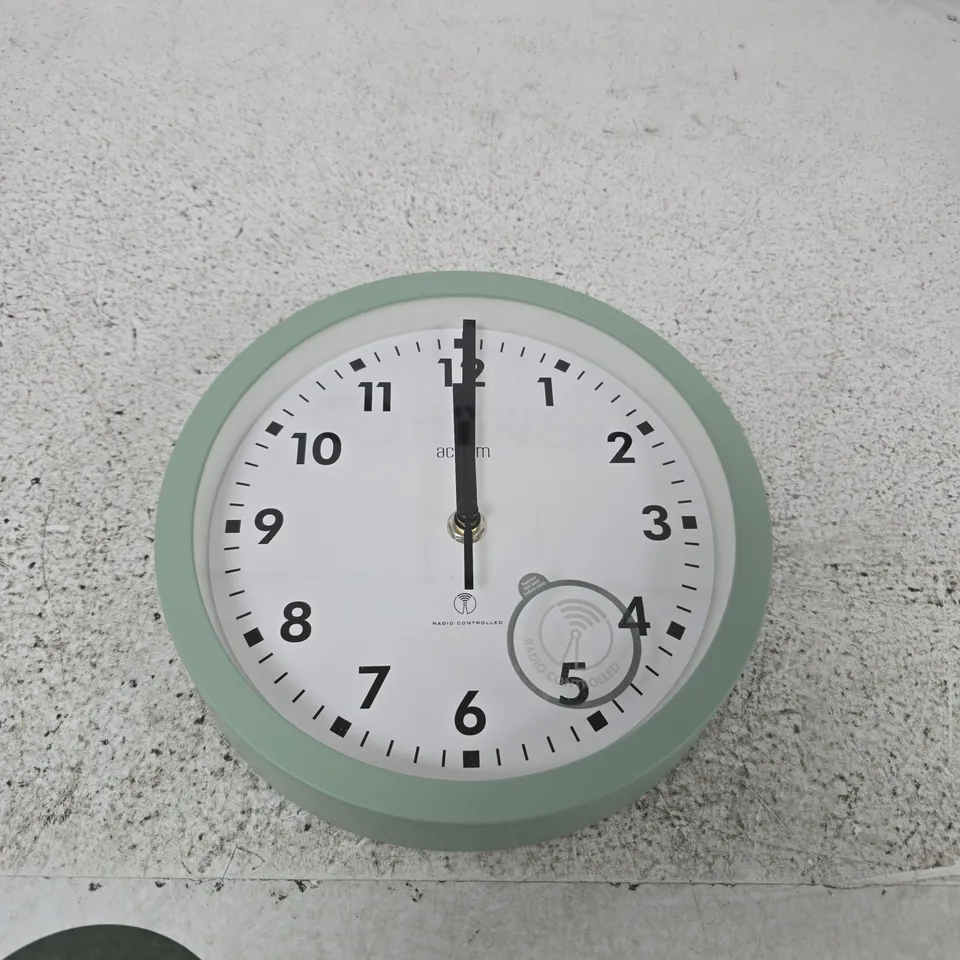 ACCTIM WALL CLOCK – WHITE DIAL WITH GREEN BEZEL