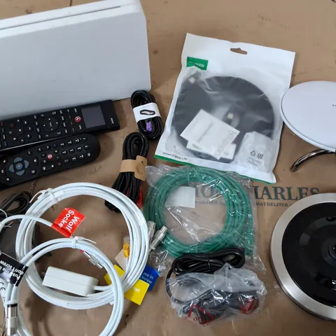 APPROXIMATELY 10 ASSORTED HOUSEHOLD ITEMS TOO INCLUDE TV REMOTES, WIFI ROUTERS, AND ASSORTED WIRES ETC. 