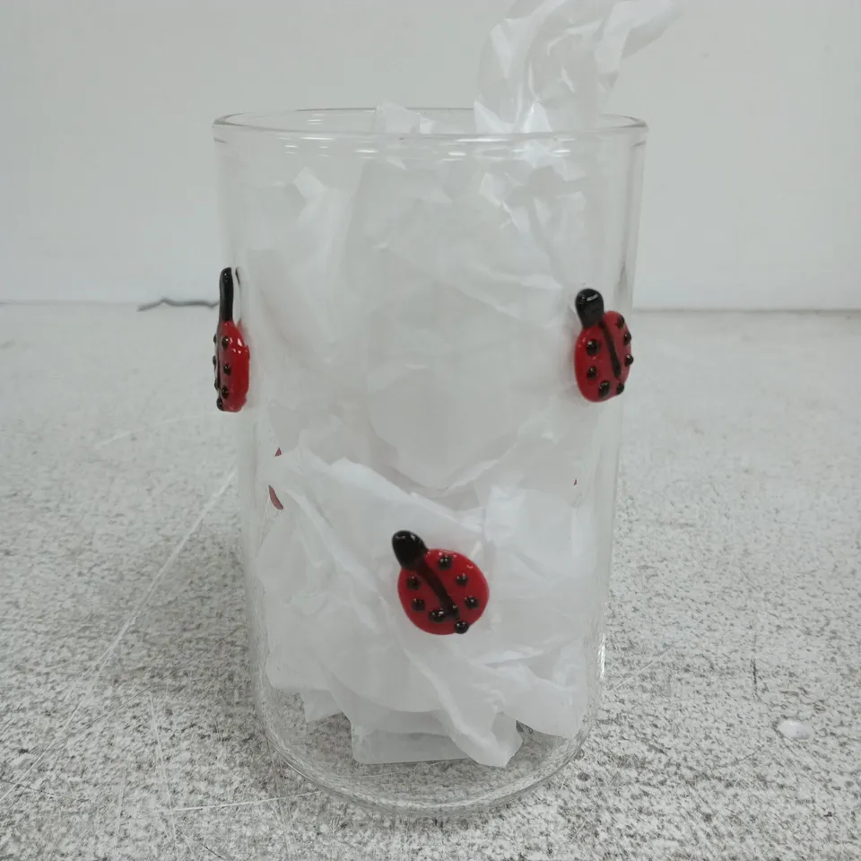 ANTHROPOLOGIE GLASS TUMBLER WITH RED LADYBUG EMBELLISHMENTS
