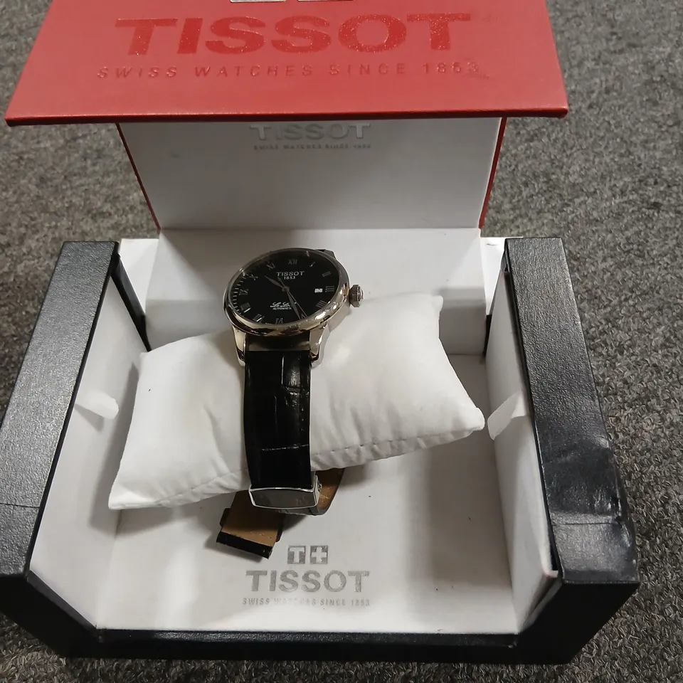 TISSOT LE LOCLE AUTOMATIC WATCH – BLACK DIAL, LEATHER STRAP