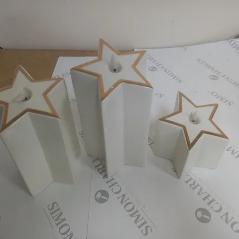 BOXED OUTLET HOME REFLECTIONS CERAMIC STAR PRE-LIT CANDLES