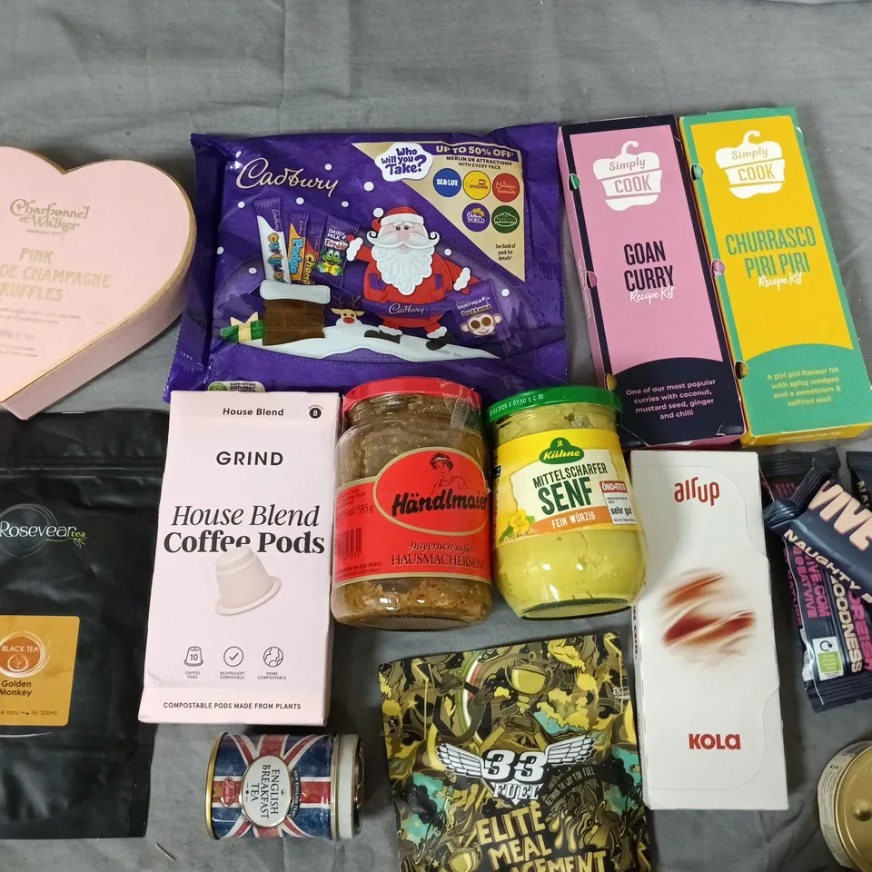 LOT OF APPROXIMATELY 25 ASSORTED FOOD ITEMS TO INCLUDE SIMPLY COOK FLAVOURINGS, COFFEE PODS AND HIVE PROTEIN BARS