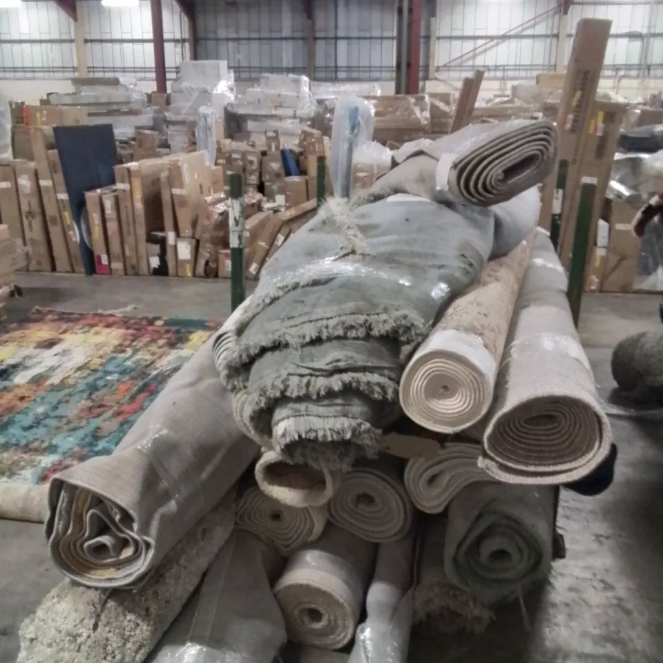 STILLAGE OF APPROXIMATELY 20 QUALITY DESIGNER RUGS