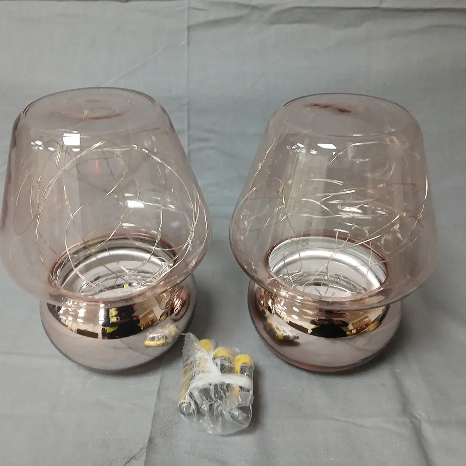 Pair of pink glass table lamps with chrome bases
