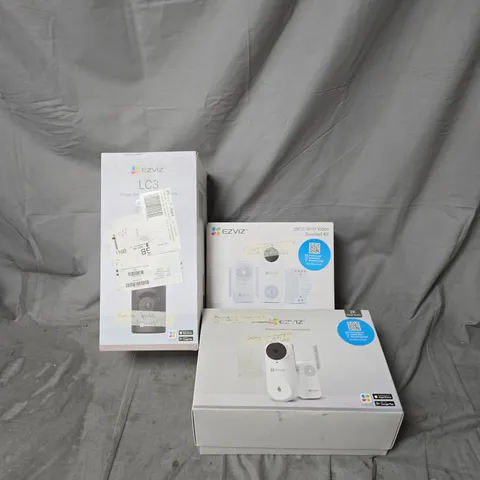 3 X ASSORTED EZVIZ ELECTRONIC SECURITY KITS INCLUDING BATTERY POWERED VIDEO DOORBELL, WIFI VIDEO DOORBELL KIT AND SMART SECURITY CAMERA. (FAULTY)