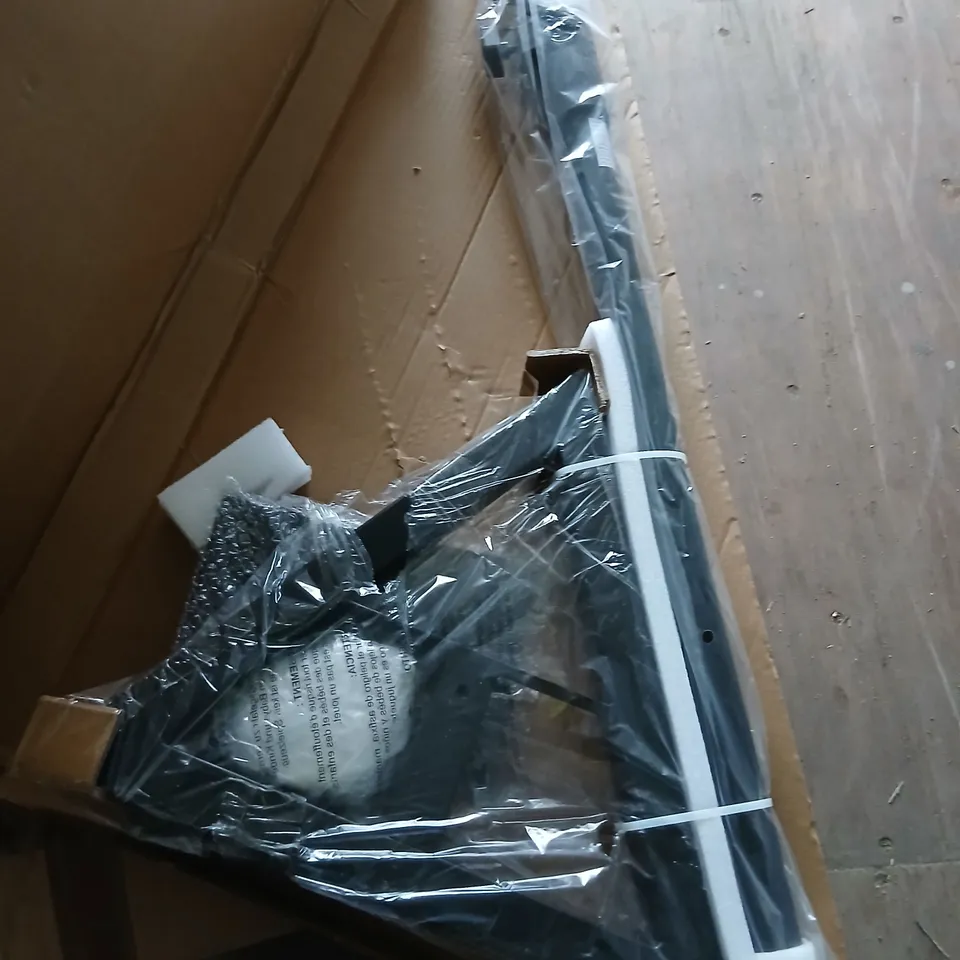 LONG BLACK ELECTRONIC ACCESSORY IN PACKAGING (BOXED)