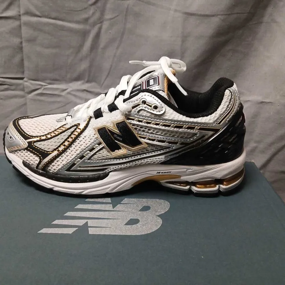 NEW BALANCE W1906RA LIFESTYLE WOMEN'S SNEAKERS – WHITE/BLACK/GOLD