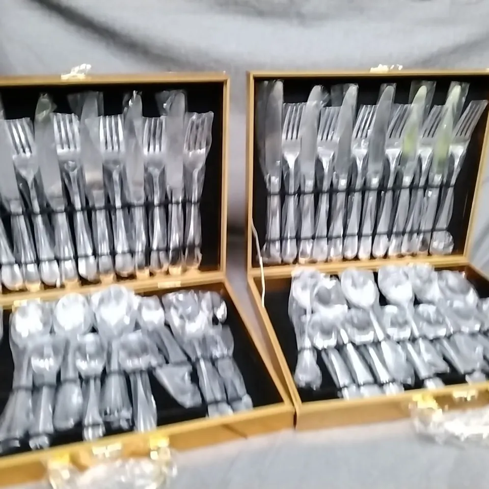 2 BOXED CUTLERY SETS 