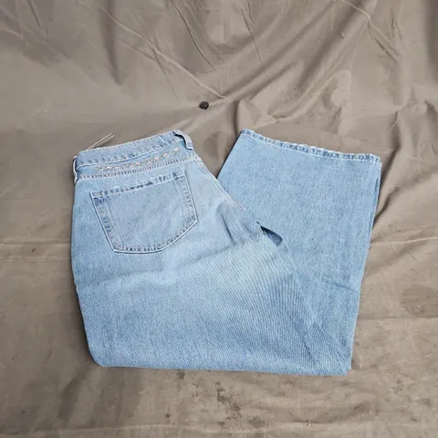HOLLISTER LOW-RISE BAGGY FLORAL EMBROIDERED JEANS IN BLUE SIZE W26 SHORT