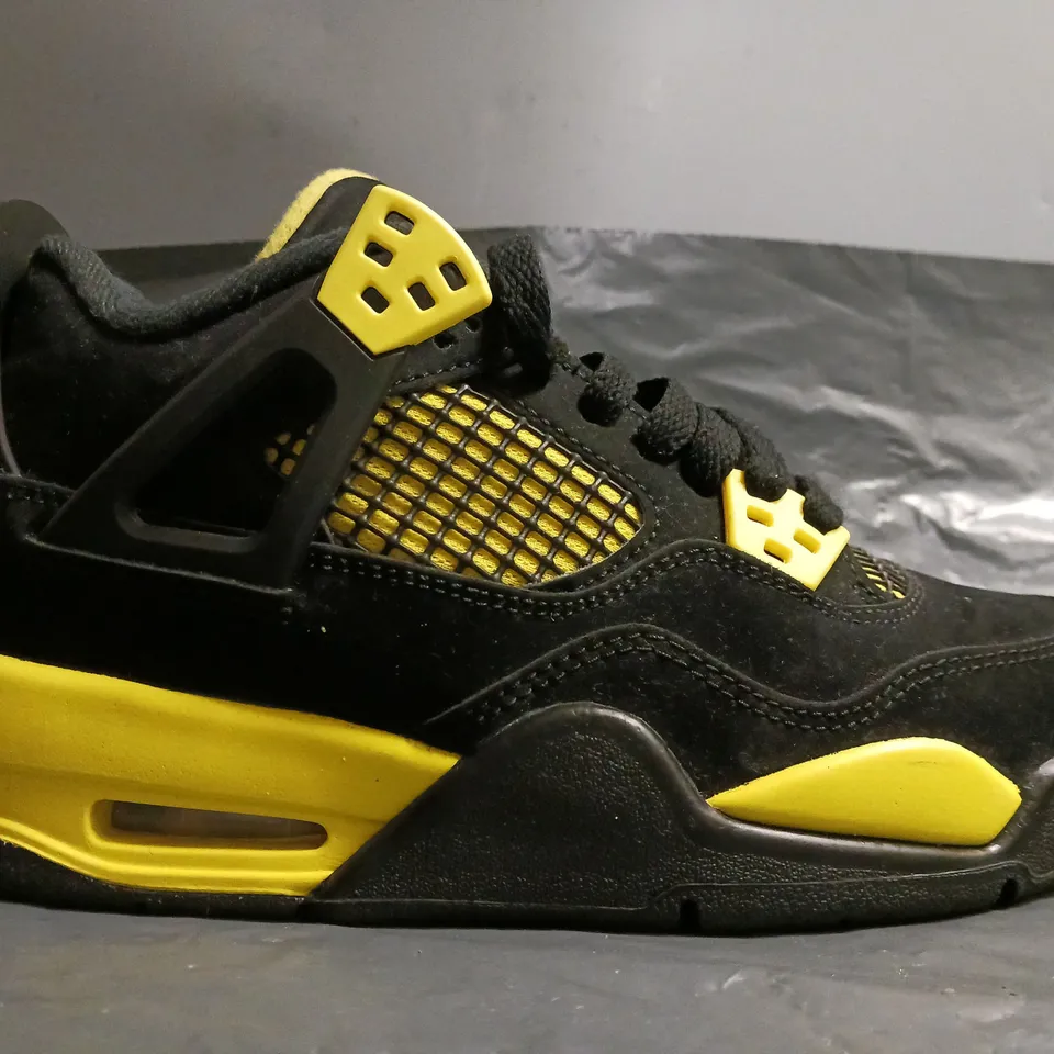 BOXED PAIR OF NIKE AIR JORDAN 4 RETRO SHOES IN BLACK/YELLOW SIZE UK 3