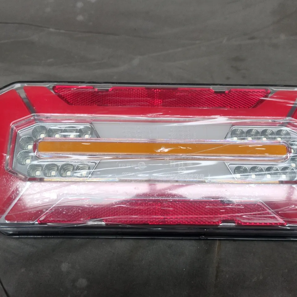 APPROXIMATELY 6 BOXED VTA-05 REAR TAIL LIGHTS 