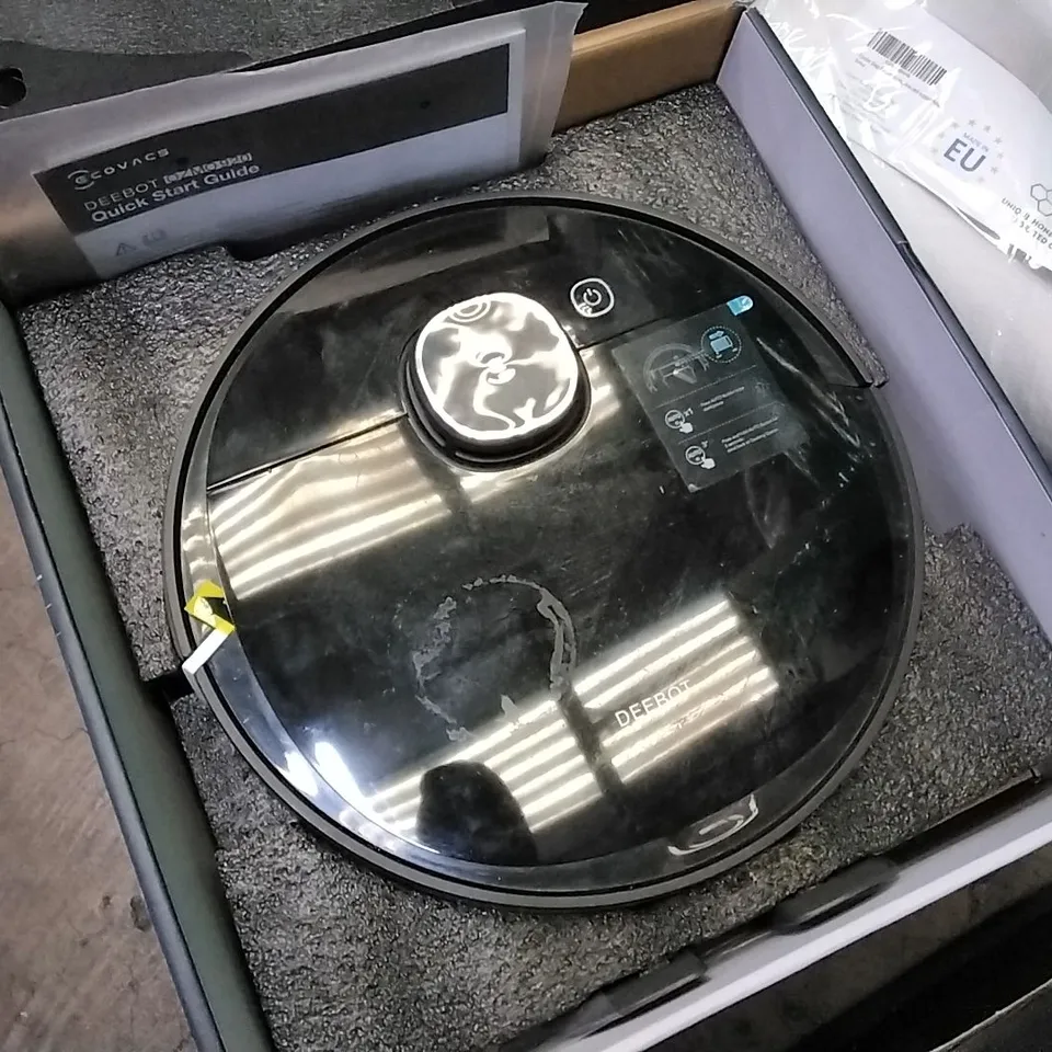 PALLET OF ASSORTED ITEMS TO INCLUDE: ECOVACS DEEBOT, MEMORY FOAM PILLOW, BACK CUSHION, REUSABLE GROCERY BAGS ETC ETC