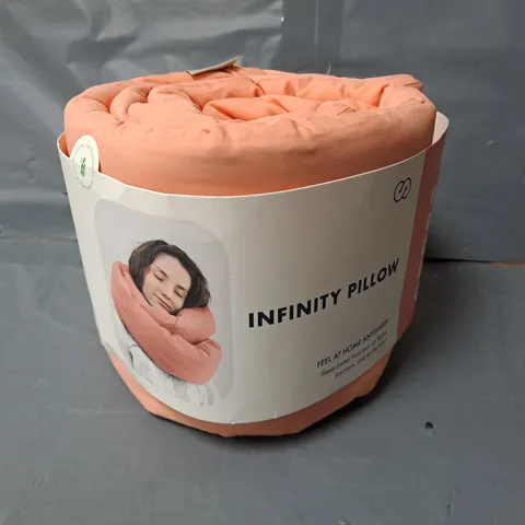 INFINITY TRAVEL PILLOW IN SALMON