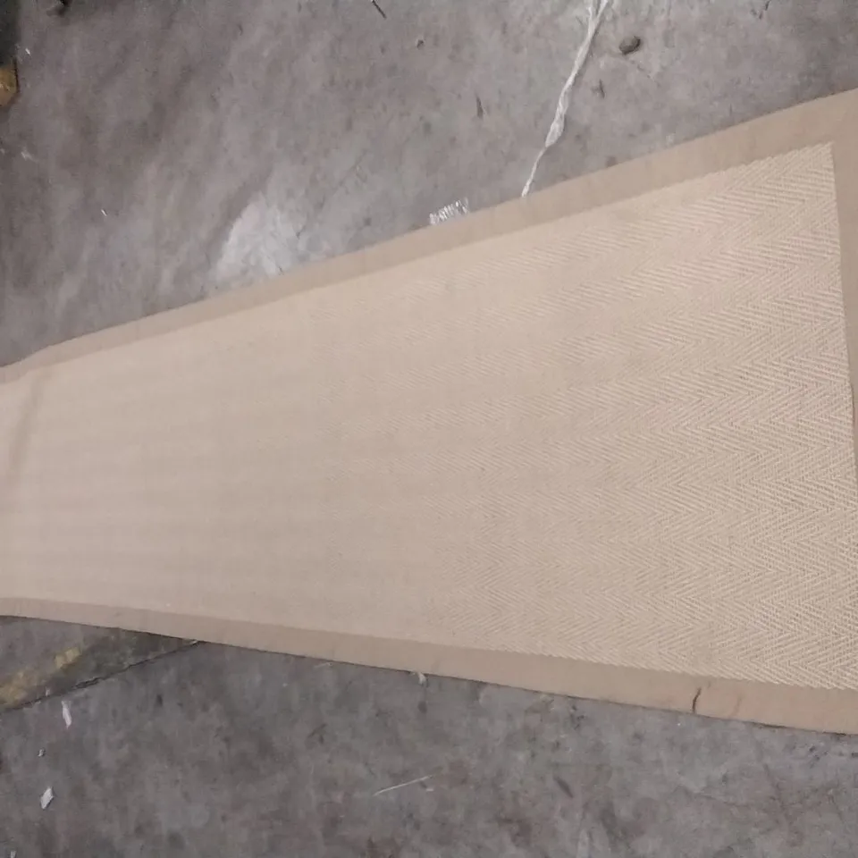 STILLAGE OF APPROXIMATELY 25 DESIGNER RUGS