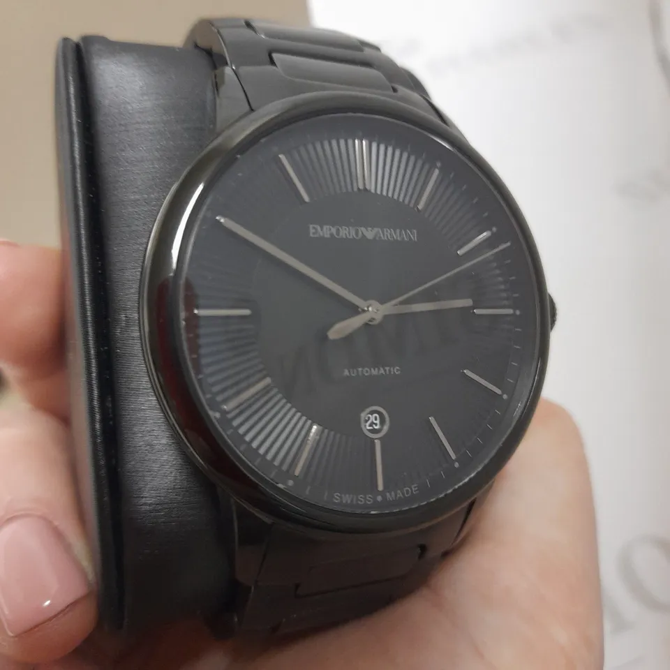 EMPORIO ARMANI SWISS AUTOMATIC BLACK STAINLESS STEEL WATCH WITH LINK FASTENING DETAIL