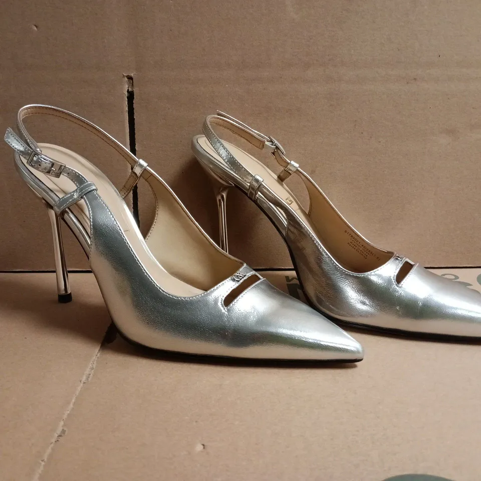 PAIR OF CHARLES & KEITH POINTED TOE STILETTO SLINGBACK HEELS IN METALLIC SILVER SIZE EU 40