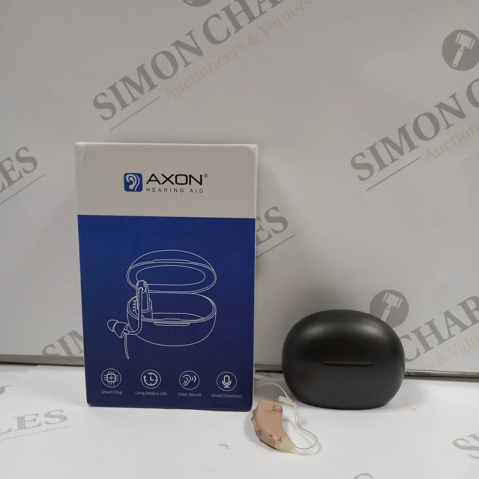 BOXED AXON HEARING AIDS IN PINK