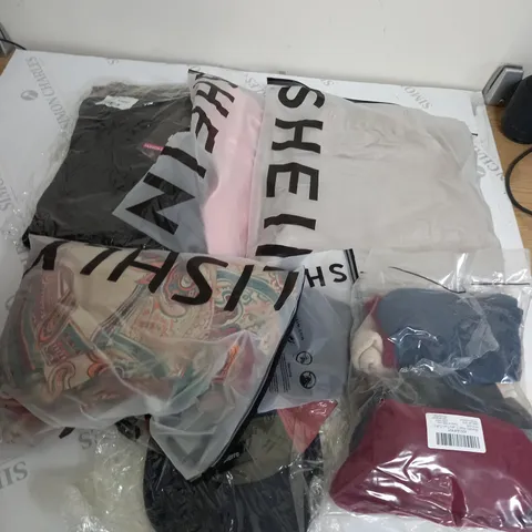 LARGE BOX OF ASSORTED CLOTHING ITEMS IN VARIOUS COLOURS AND SIZES INCLUDING TROUSERS , TOPS AND JUMPERS