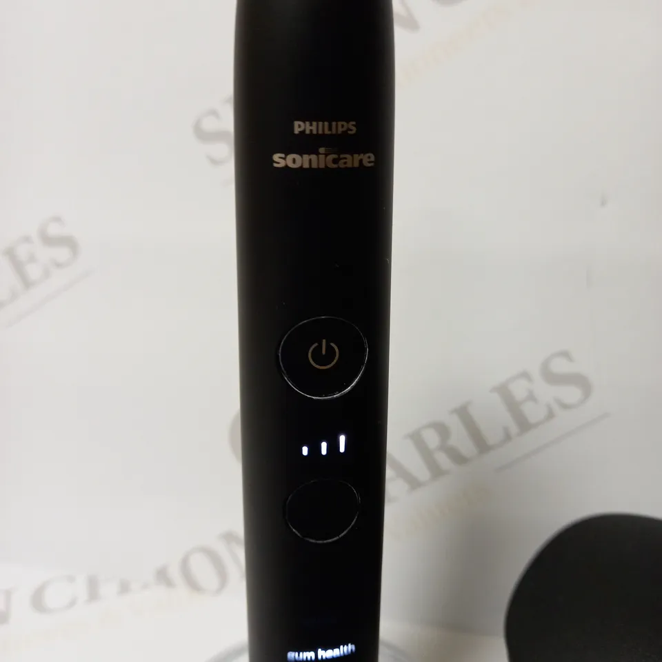 PHIILIPS SONICARE ELECTRIC TOOTHBRUSH WITH TRAVEL CASE 