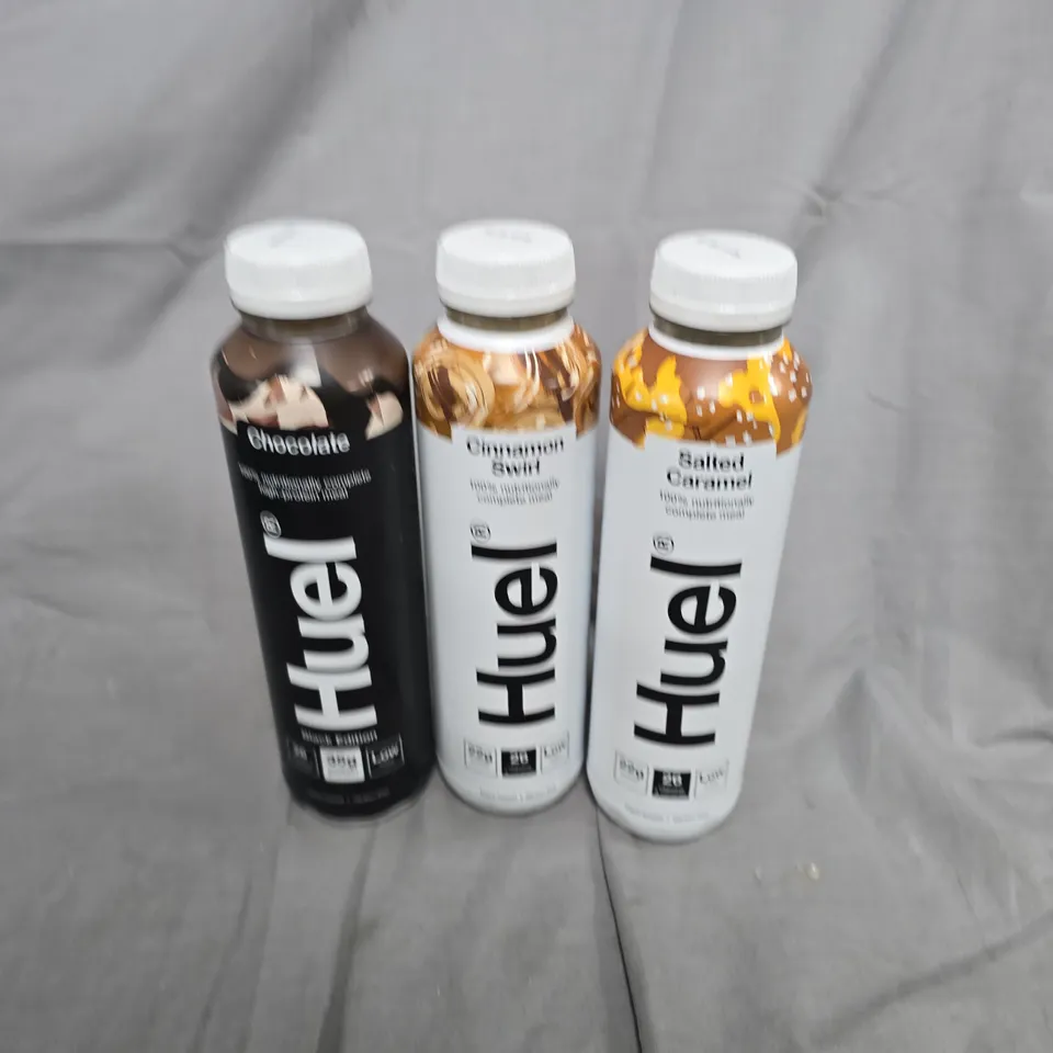 APPROXIMATELY 14 ASSORTED HUEL PRODUCTS TO INCLUDE BLACK EDITION CHOCOLATE, CINNAMON SWIRL, SALTED CARAMEL, ETC - COLLECTION ONLY