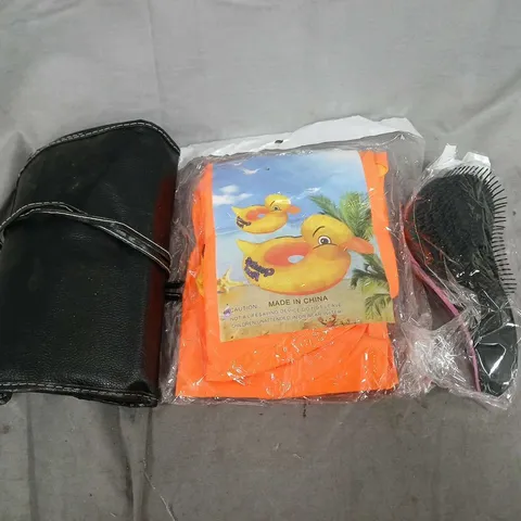 box of approx 15 assorted items to include hairbrushs, leather bags and pool toys