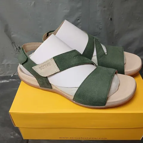 BOXED PAIR OF STRIVE JINNY SANDALS IN GREEN - UK 7