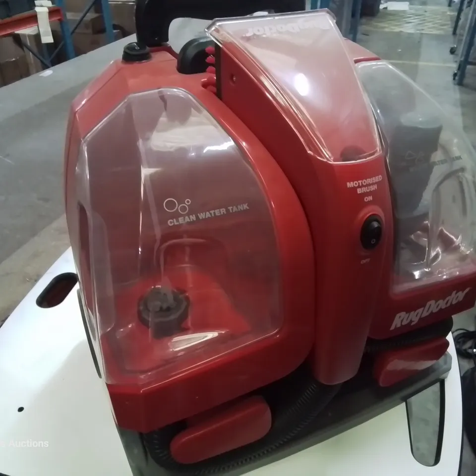 BOXED RUG DOCTOR PORTABLE SPOT CLEANER