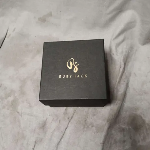 RUBY JACK GOLD-TONE BRACELET WITH CHARMS – BOXED