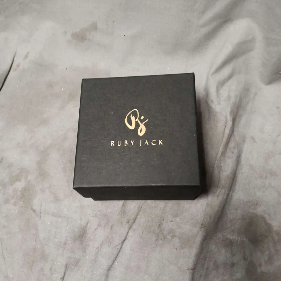 RUBY JACK GOLD-TONE BRACELET WITH CHARMS – BOXED