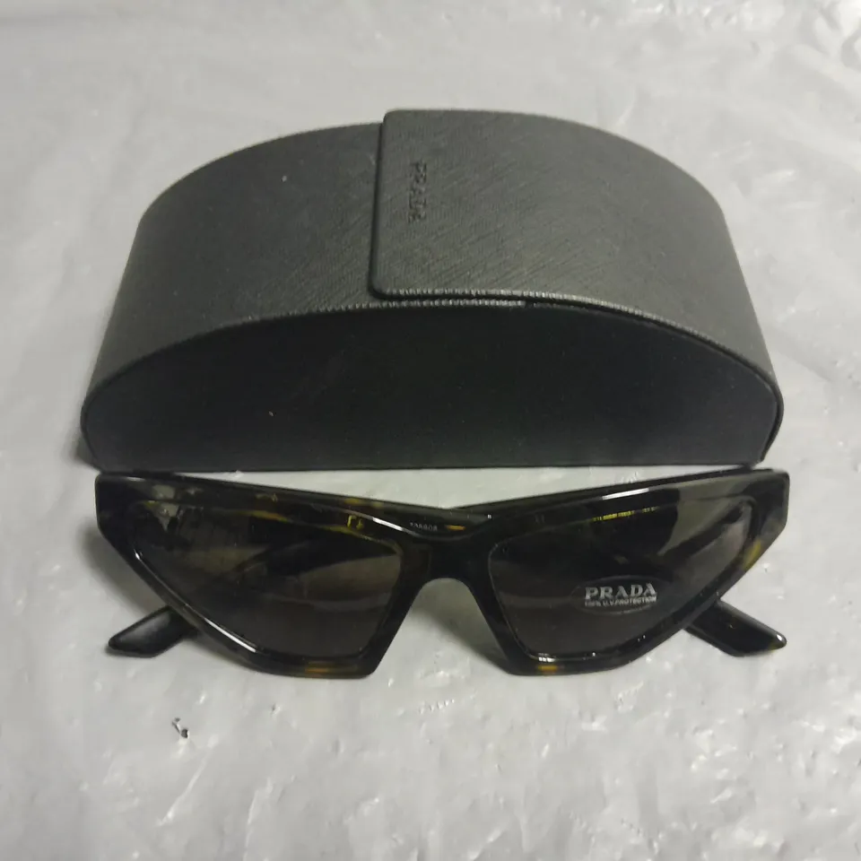 PAIR OF PRADA ANGULAR GLASSES