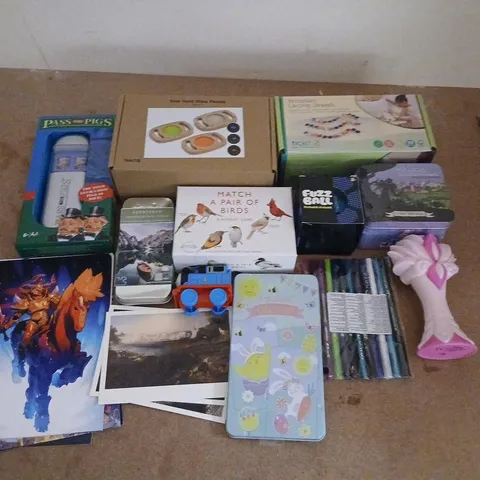 LARGE QUANTITY OF ASSORTED TOYS AND ACCESSORIES TO INCLUDE; FUZZ BALL, WOODEN LACING JEWELS, MATCH A PAIR OF BIRDS, PASS THE PIG AND THE SIEGE OF SHADDIS HORNE A TINY TIN TALE