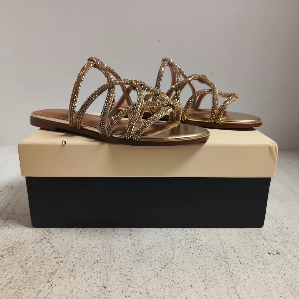 BOXED PAIR OF KURT GEIGER PERLA OPEN TOE FLAT SANDALS IN GOLD W. JEWEL DETAIL SIZE EU 37