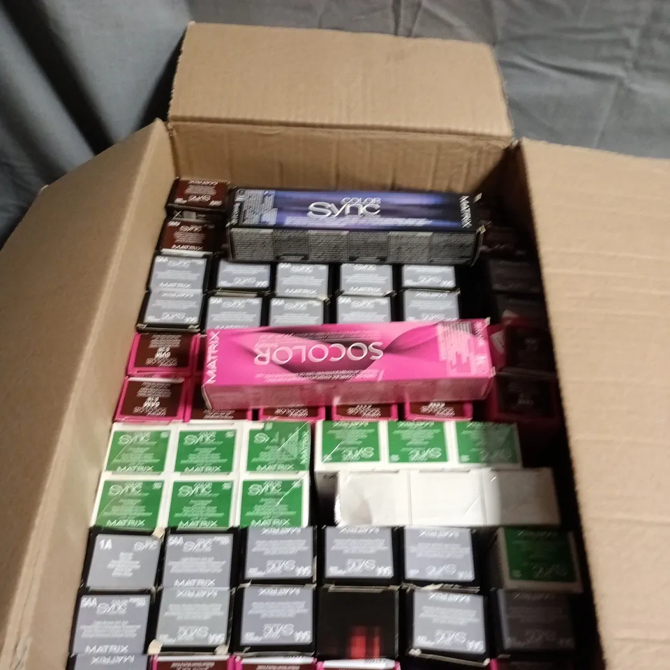 BOX OF APPROXIMATELY 60 MATRIX HAIR CARE PRODUCTS INCLUDING COLOR SYNC 5 MINUTE FAST TONER, COLOR SYNC LIGHT BROWN ASH/LIGHT BROWN MOCHA RED AND SO COLOR MEDIUM BROWN MOCHA VIOLET