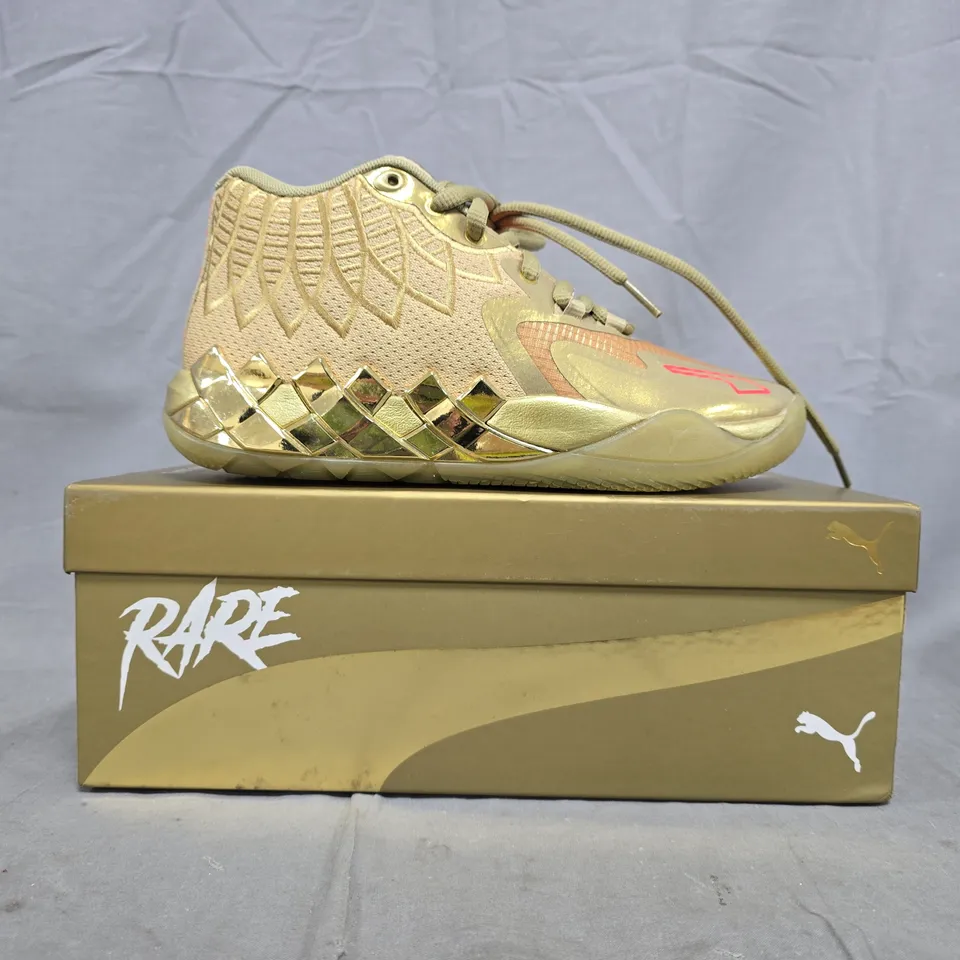 BOXED PAIR OF PUMA MB.01 GOLDEN CHILD SHOES IN METALLIC GOLD SIZE UK 4