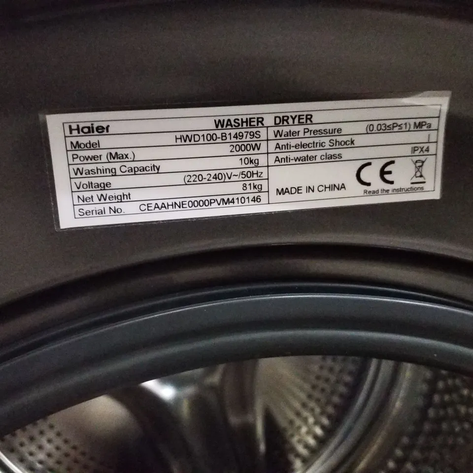 HAIER FREESTANDING WASHER DRYER IN GRAPHITE - UNPROCESSED RAW RETURN