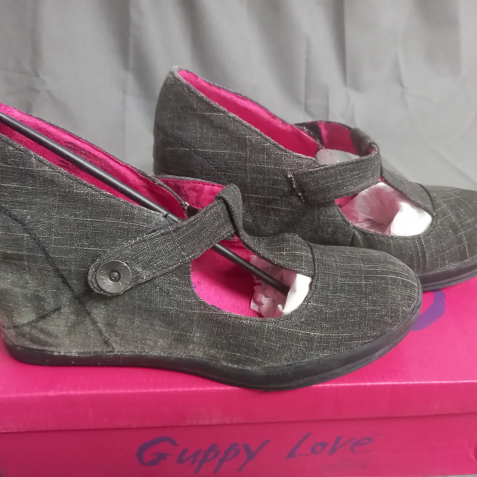 BOX OF APPROXIMATELY 10 BLACK  GUPPY LOVE BY BLOWFISH SHOES IN VARIOUS SIZES 