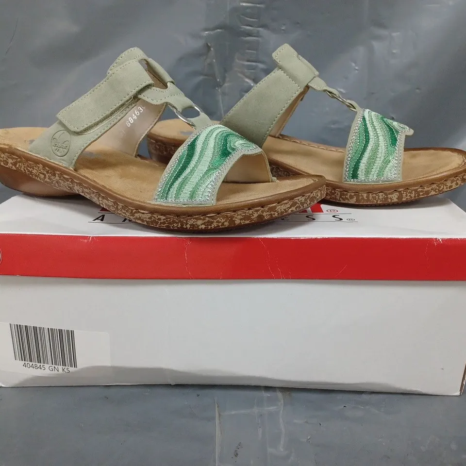 BOXED PAIR OF RIEKER SANDALS IN GREEN SIZE 5