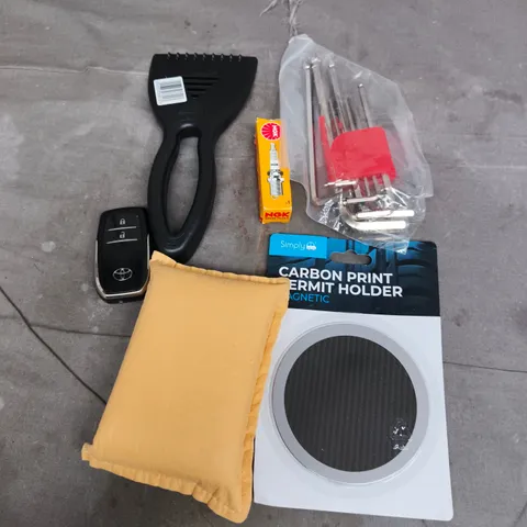 APPROXIMATELY 10 ASSORTED VEHICLE PARTS AND ACCESSORIES TO INCLUDE SPARK PLUG, PERMIT HOLDER, WINDOW SCRAPER ETC