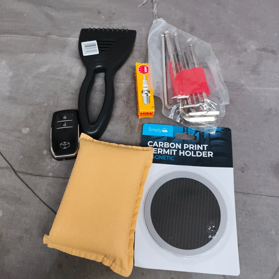 APPROXIMATELY 10 ASSORTED VEHICLE PARTS AND ACCESSORIES TO INCLUDE SPARK PLUG, PERMIT HOLDER, WINDOW SCRAPER ETC