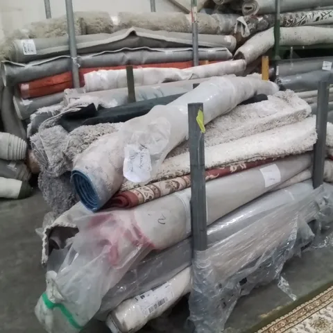 STILLAGE OF APPROXIMATELY 20 QUALITY DESIGNER RUGS