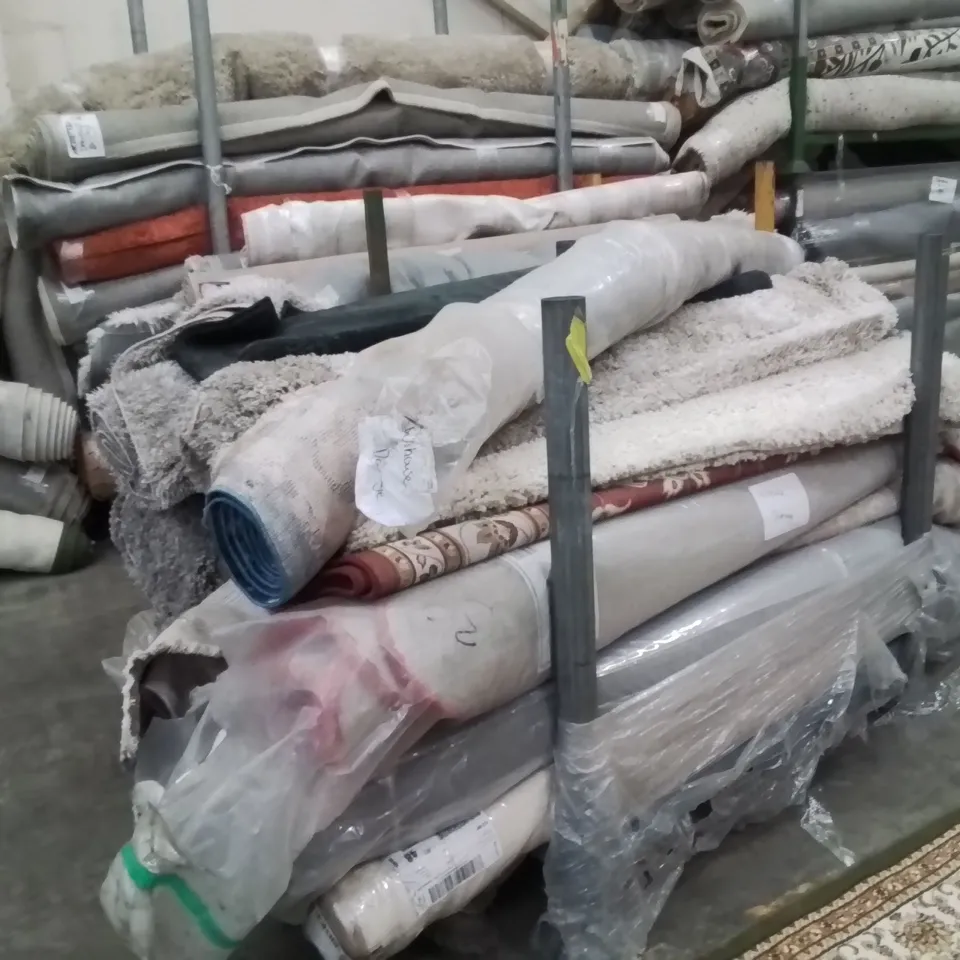 STILLAGE OF APPROXIMATELY 20 QUALITY DESIGNER RUGS