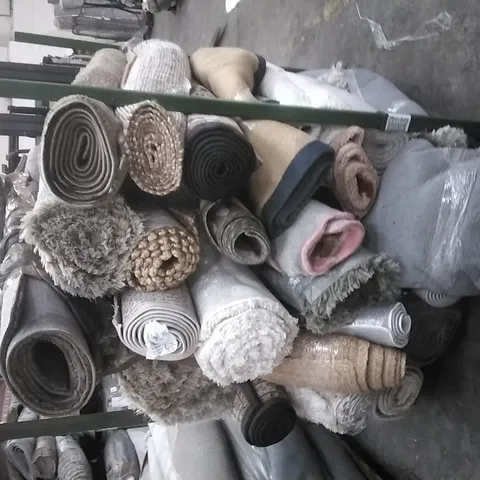 STILLAGE OF APPROXIMATELY 25 DESIGNER RUGS