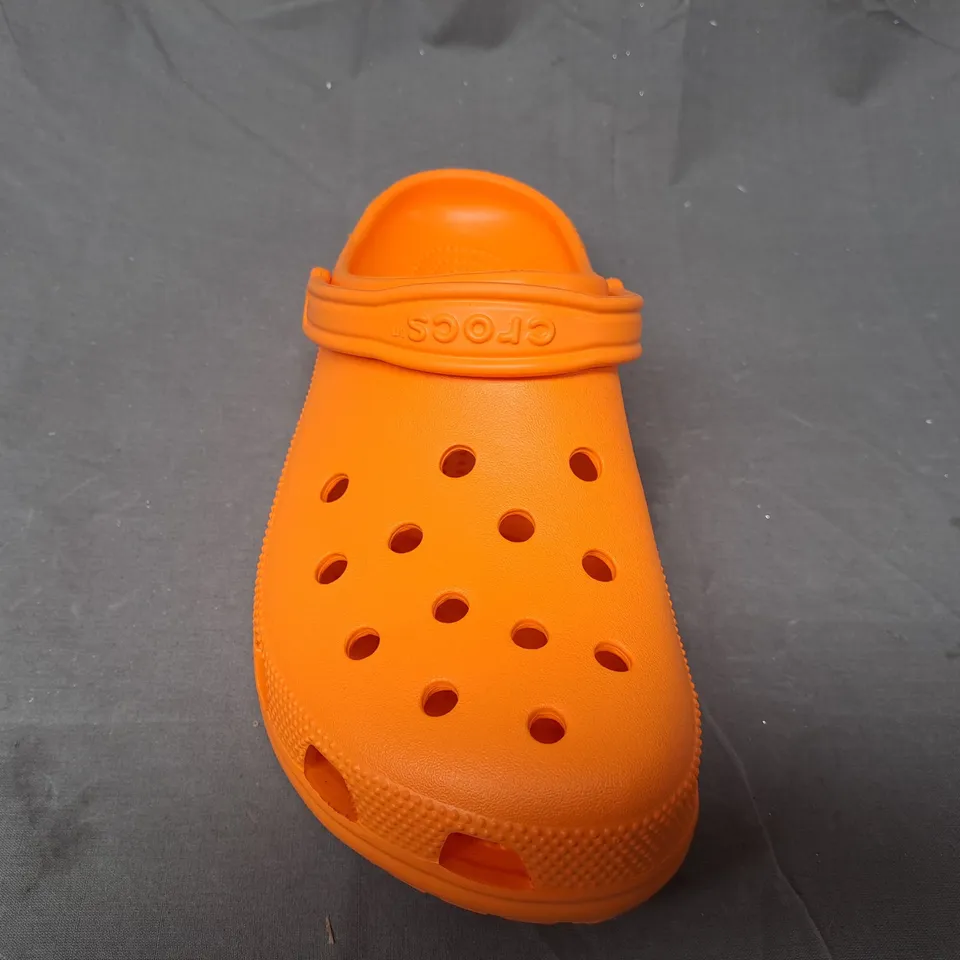 PAIR OF CROCS CLASSIC CLOGS IN ORANGE SIZE M13